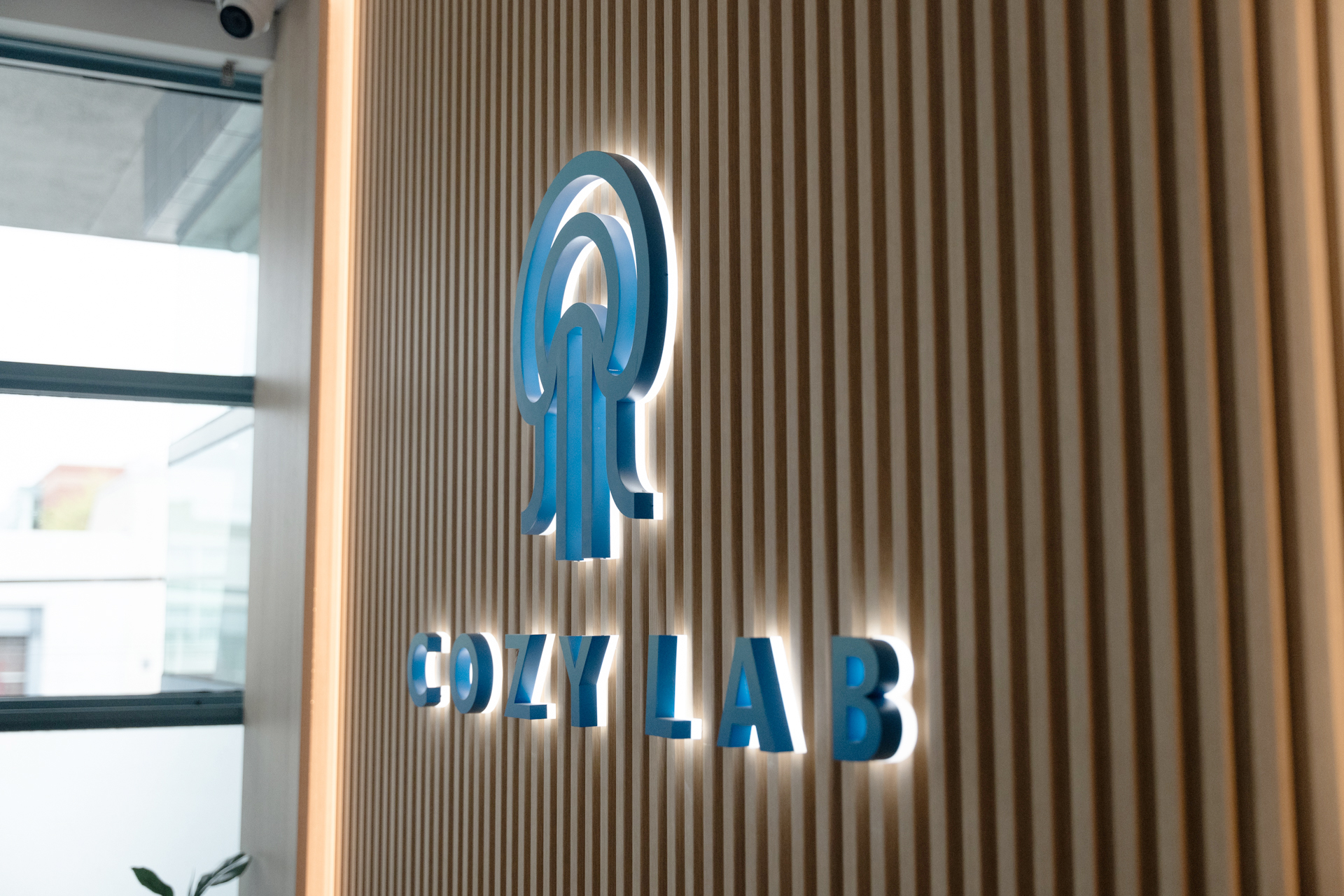 metal sign installed indoors for Cozylab